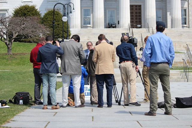 Reporters cover a press conference held by gubernatorial candidate Peter Galbraith Monday outside the Vermont Statehouse. - PAUL HEINTZ