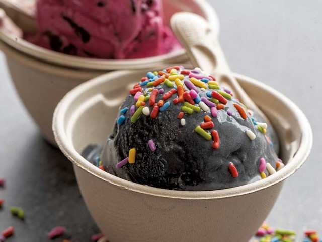 Scoops of coconut-charcoal with sprinkles (front) and beet-chocolate chip - JAMES BUCK