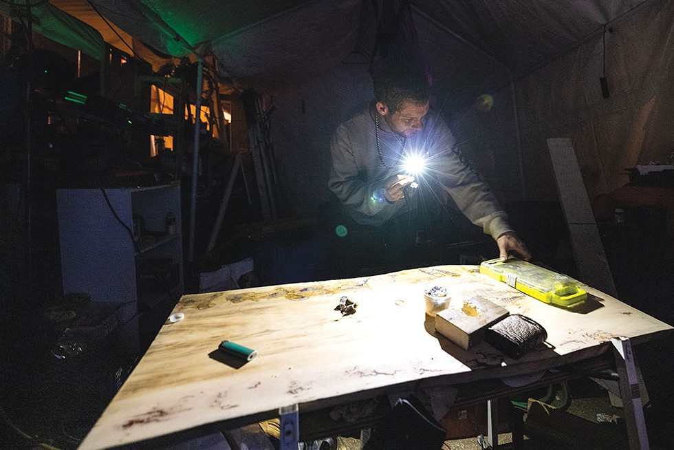Jordan Orcutt woodworking by flashlight - JAMES BUCK