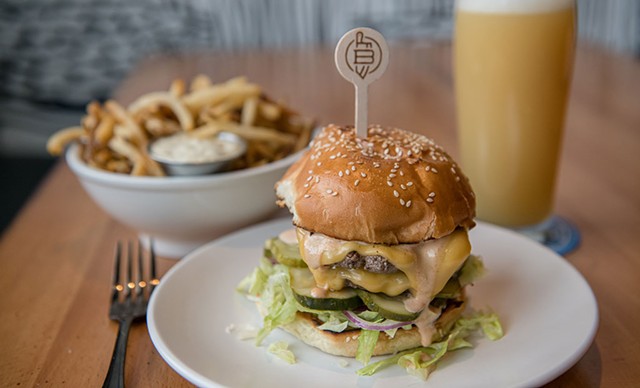 A Double Stack Smash Burger and hand-cut fries - DARIA BISHOP