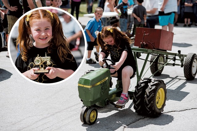 Aliana Talcott, 6, of Fairfield, gives it her all during the Pedal Pull. - SAM SIMON
