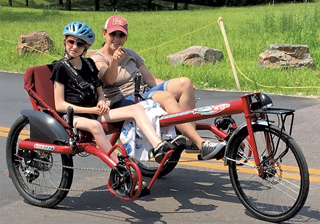 Hannah and Shelly on a recumbent bike - COURTESY OF DEBBIE LAMDEN