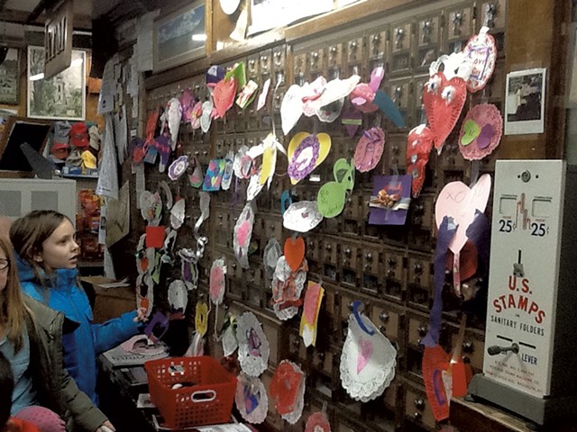 Izzy Wills and the post office boxes she and other students decorated for Valentine's Day - COURTESY OF THE ELMORE SCHOOL