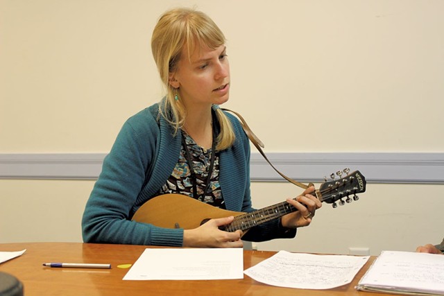 Mary Bonhag strums her mandolin, putting music to words - COURTESY OF LUND