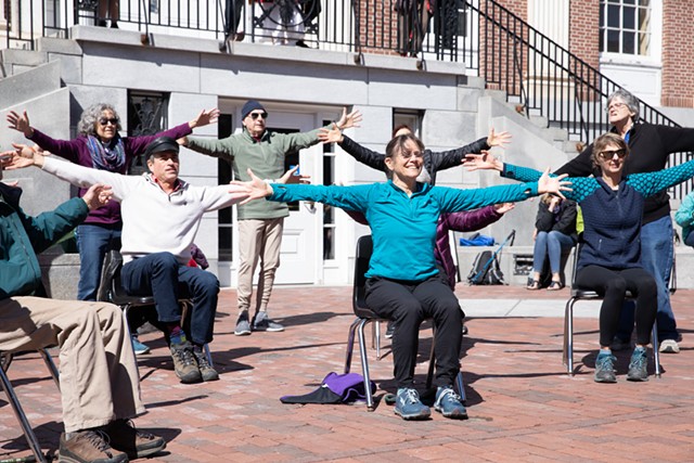 The Flynn's Movement for Parkinson's and wellness class performs on Church Street. - CAT CUTILLO