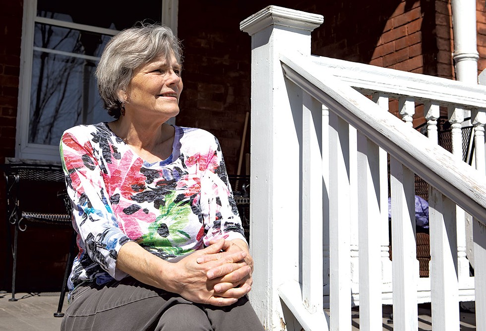 Ginny McGehee on her porch in Fort Ethan Allen - LUKE AWTRY