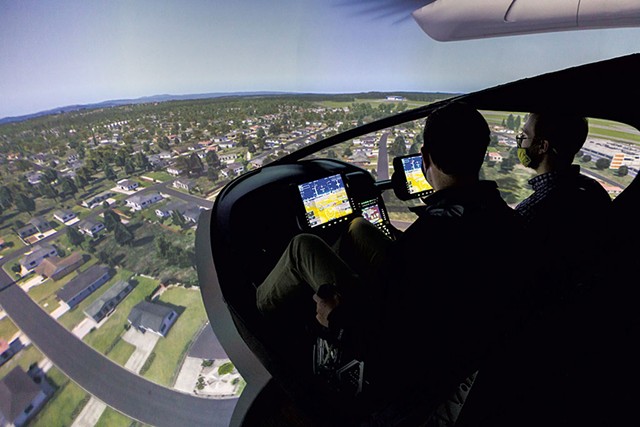 Beta Technologies CEO Kyle Clark (left) operating the company's flight simulator - FILE: OLIVER PARINI