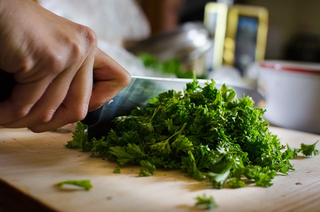 Chopping curly parsley for gremolata - H.B. WILCOX PHOTOGRAPHY