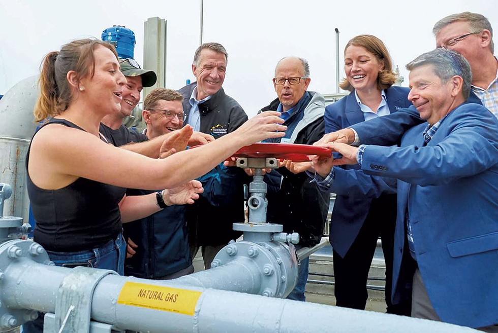 Danielle Goodrich Gingras (left) leading a ceremonial turning of the spigot to start the flow of natural gas at her family farm's renewable energy facility - COURTESY OF VANGUARD RENEWABLES