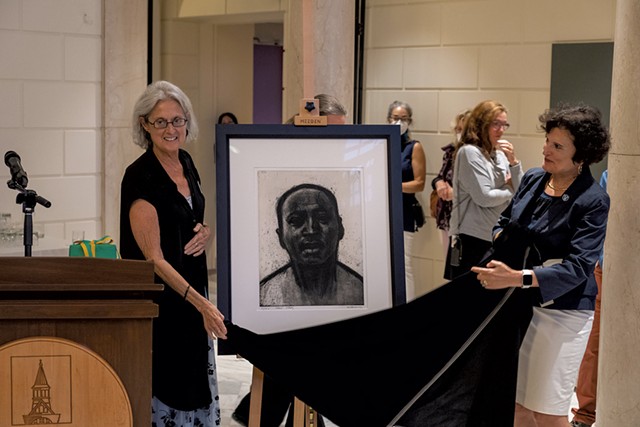 Janie Cohen (left) and Patricia Prelock unveiling "Head Study" by John Wilson, purchased by the Fleming Museum and presented to Cohen at her retirement party - COURTESY OF CHRIS DISSINGER