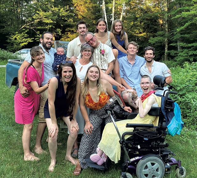 Willem and Ellen Jewett (center) with family and friends at their June 2021 wedding - COURTESY