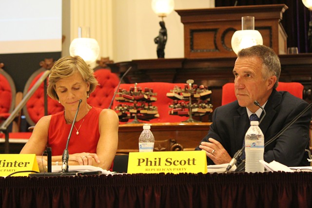 Sue Minter and Phil Scott at a gubernatorial forum Thursday at the Statehouse - PAUL HEINTZ