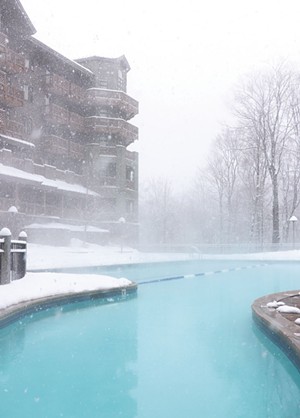 The heated outdoor pool at Spruce Peak Lodge - COURTESY