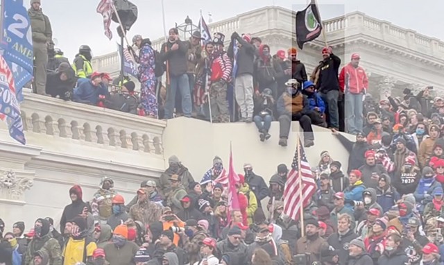 Nicholas Languerand at the Capitol with his Pepe the Frog flag on January 6 - COURTESY OF U.S. DEPARTMENT OF JUSTICE