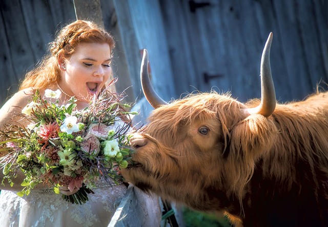 Samantha Granger and a Scottish Highland cow - COURTESY OF MYRA HUDSON PHOTOGRAPHY