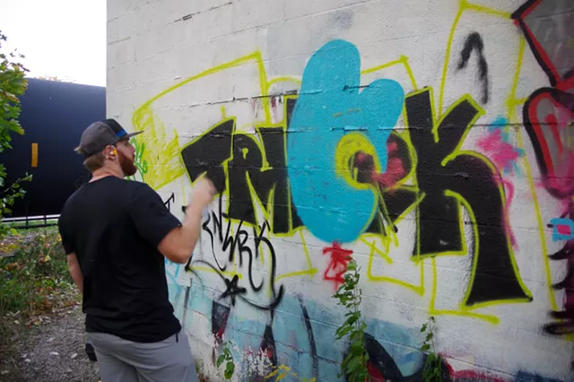 Champlain College Students Color South End Wall