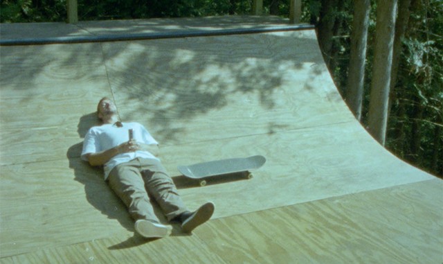 Tommy DeLitto taking a nap on the ramp after a full day of working and skating - COURTESY OF NICK STEFANI