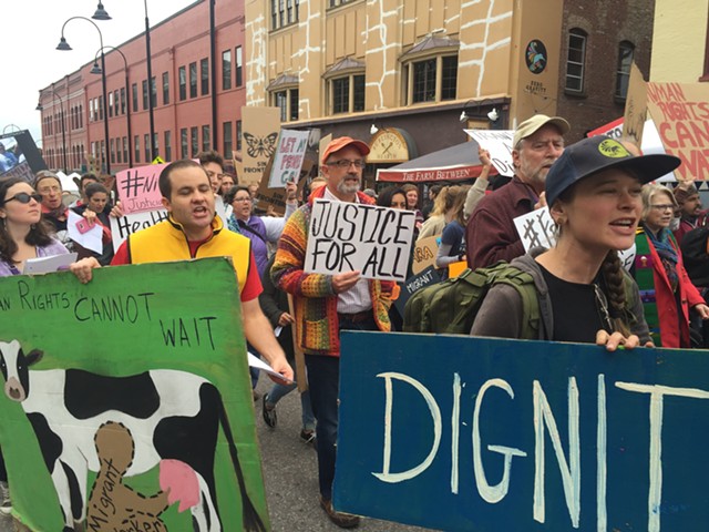 Activists march in Burlington in October. - SASHA GOLDSTEIN
