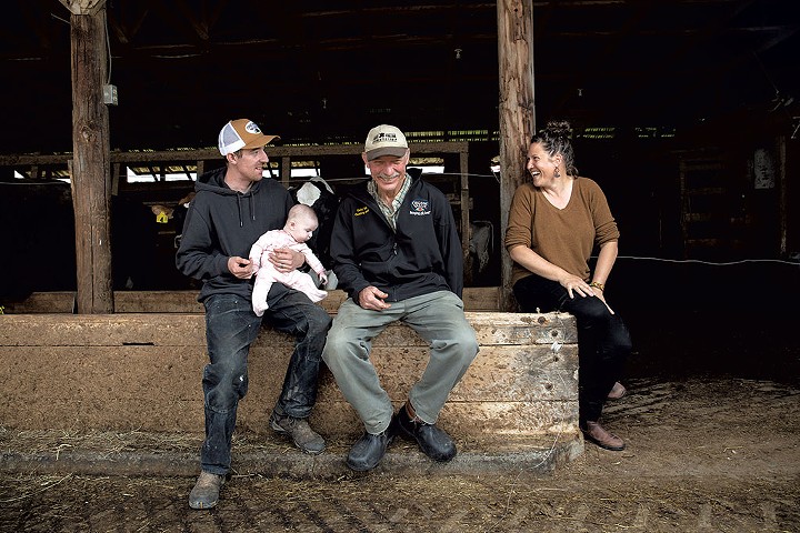 From left: Herd manager Mackenzie Wallace holding his daughter Oaklyn, Leon Corse and his daughter Abbie Corse - ZACHARY P. STEPHENS