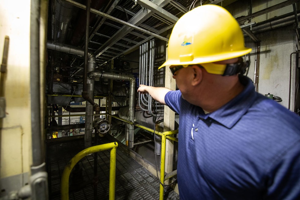 Engineer Paul Pikna pointing out equipment at the McNeil Generating Station - LUKE AWTRY