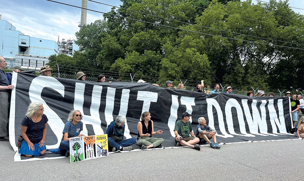Climate activists protesting at the McNeil Generating Station in July - KATIE FUTTERMAN