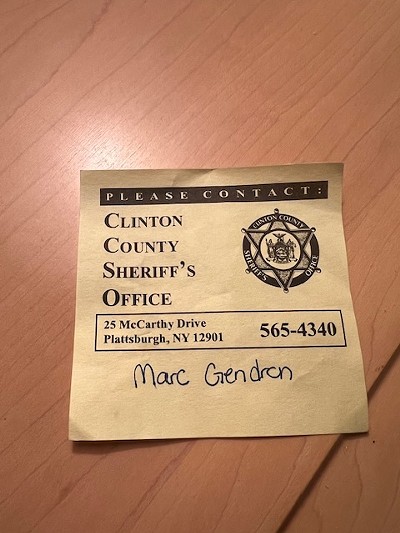 The sticker deputies left on Marc Gendron's door - COURTESY