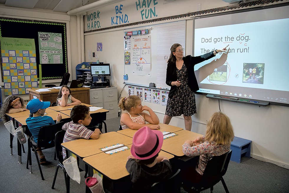 Melissa Haggett teaching reading to first graders at Vergennes Union Elementary School - DARIA BISHOP
