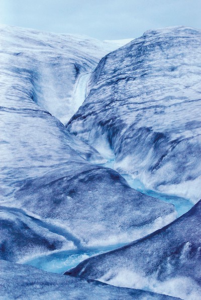 Meltwater pouring over ice at the edge of the Greenland ice sheet - COURTESY OF PAUL BIERMAN