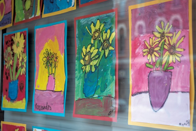 Sunflower still life paintings by Union Elementary School students at Walgreens on Main Street - KEVIN GODDARD