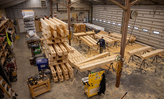Timber framer Ronnie Stetson in the Vermont Frames workshop in Starksboro - JAMES BUCK
