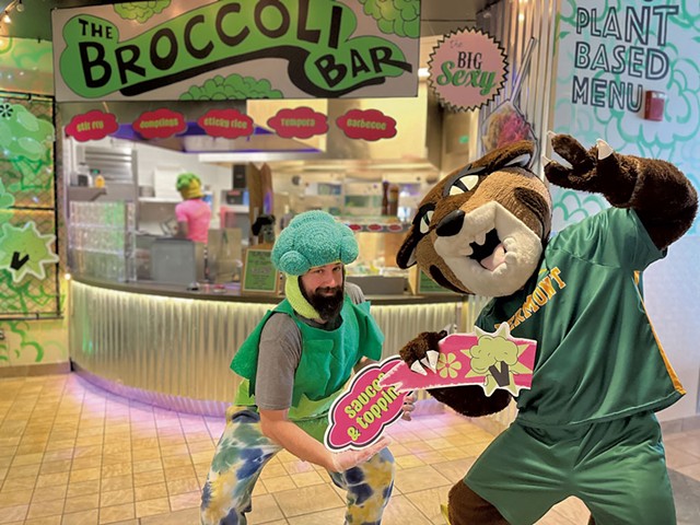 Gabe "the Broccoli Man" Marcolini (left) with the UVM mascot - COURTESY