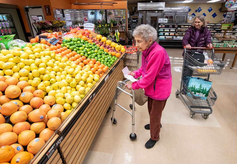 Eleanor Ahlers of Hyde Park grocery shopping with the help of Joan Greene of Lamoille Neighbors - JEB WALLACE-BRODEUR