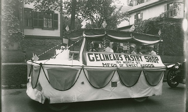 A parade float advertising Gelineau's Pastry Shop on North Street, one of several Burlington bakeries owned by French Canadians. - COURTESY OF LOUIS L. MCALLISTER COLLECTION, UVM