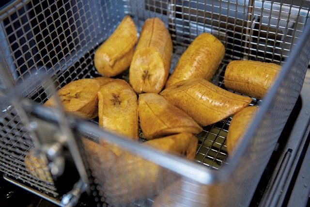 Plantains in the fryer - DARIA BISHOP