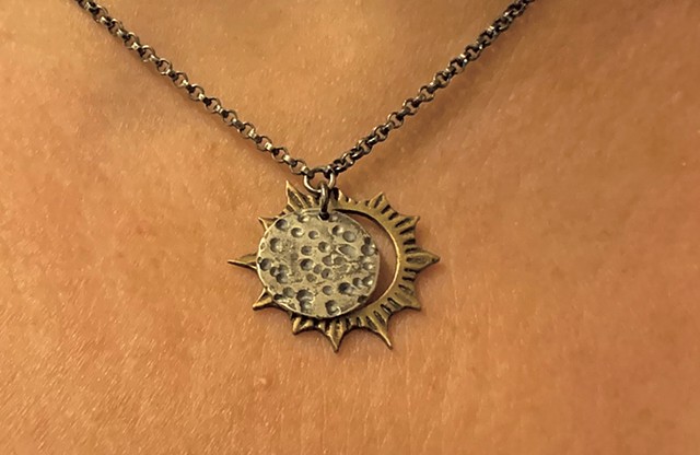 Eclipse pendant from Jennifer Kahn Jewelry - COURTESY