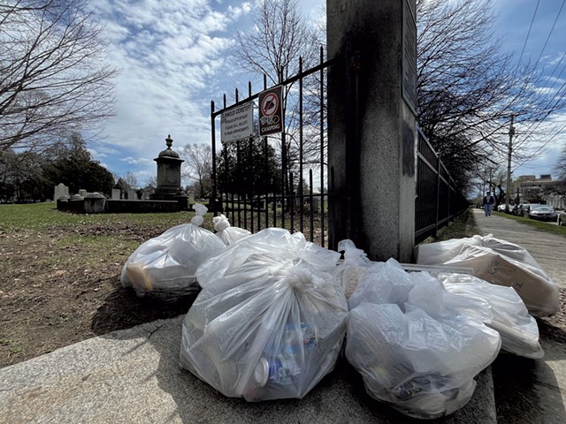 Bags of trash at Elmwood Cemetery after a community cleanup day. - PAULA ROUTLY ©️ SEVEN DAYS