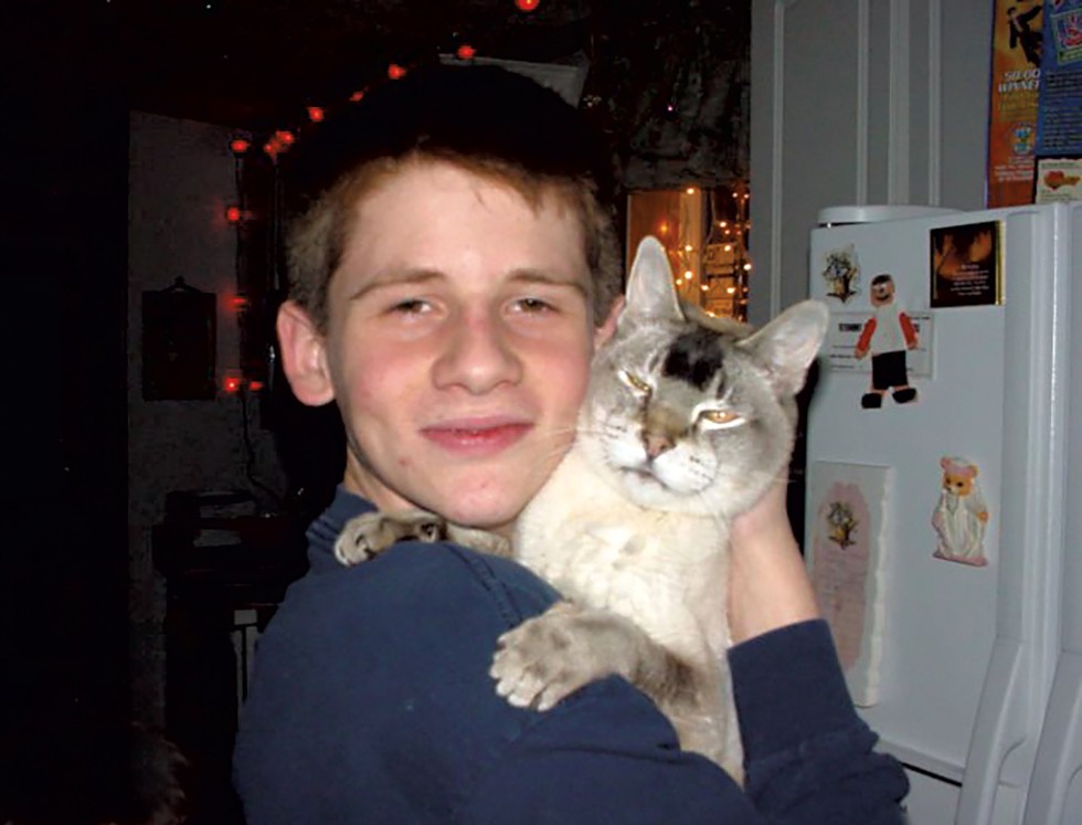 Michael at 16, with his cat, Kitty Baby - COURTESY