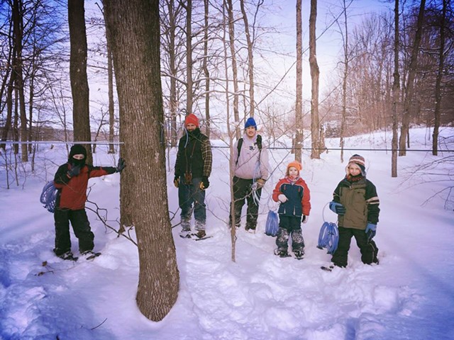 While Visiting Randolph, Vermont, a family of five went snowshoeing in the sugarbush at Silloway Maple