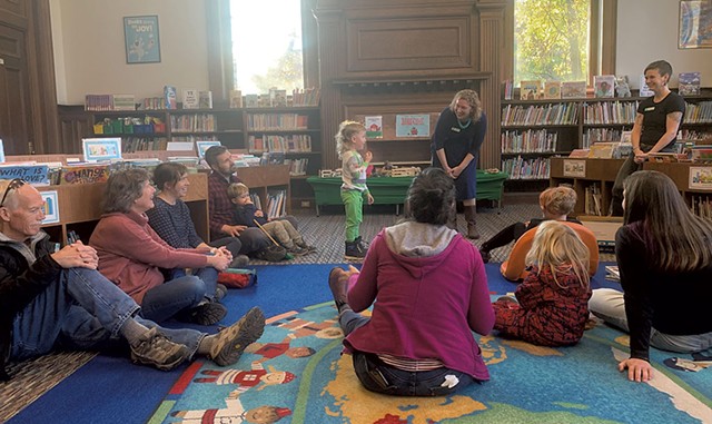 A graduate of the 1000 Books Before Kindergarten program is recognized at  Fletcher Free Library for his accomplishment. - COURTEY