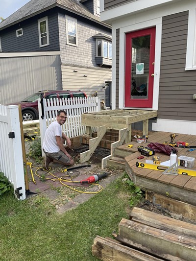 Patrick Weise, Marian Price's neighbor, preparing the home for the WheelPad on Friday - COURTESY OF MARIAN PRICE