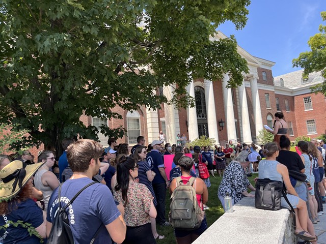 Recent University of Vermont graduate Isabella Dunn speaking at a staff union protest on campus - ANNE WALLACE ALLEN ©️ SEVEN DAYS