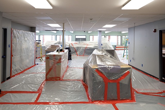 North Country Union High School's library, wrapped in plastic - DON WHIPPLE