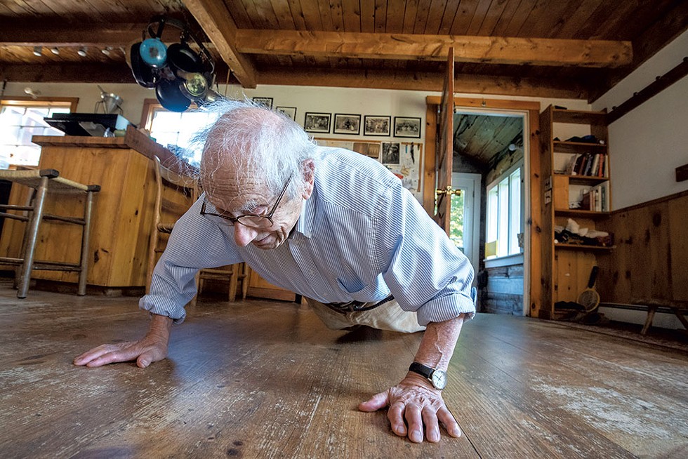 Jules Rabin doing morning push-ups at his home in Marshfield