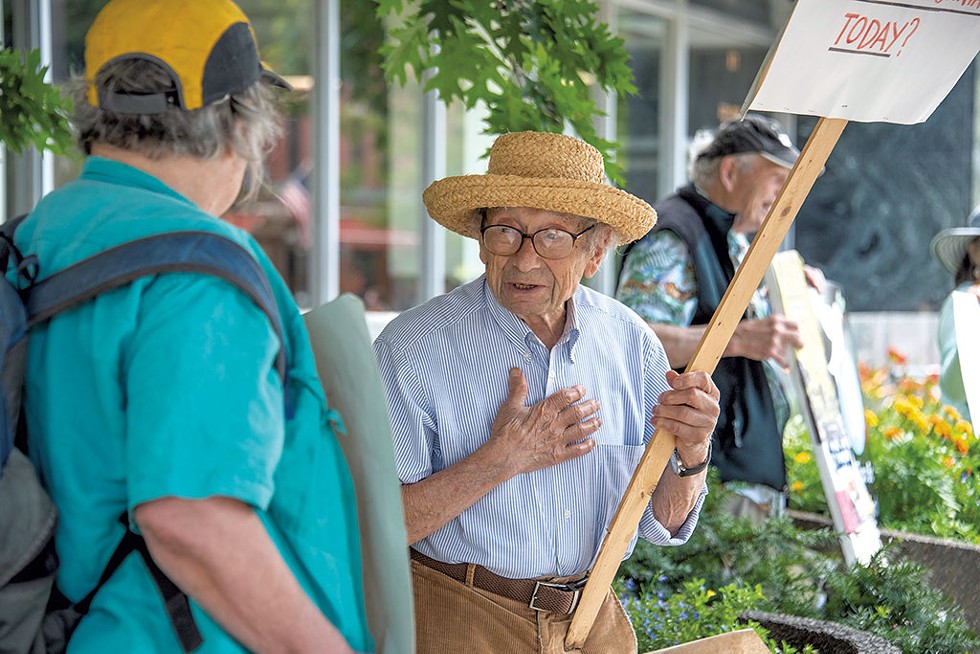 Jules Rabin at a weekly rally in Montpelier seeking peace in Gaza