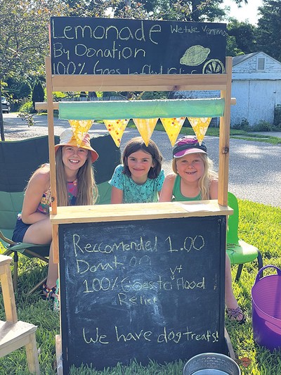 Willa and Hazel Saunders with friend Sophie selling lemonade to benefit the Intervale farmers' flood relief - COURTESY