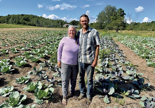 Julie Matranga and Zach Brandau in the cabbage patch - RACHEL STEARNS