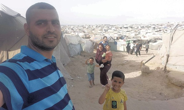 Yasser with his wife and children in Gaza - COURTESY OF CRYSTAL ZEVON