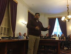 Faisal Gill speaking to the Vermont Democratic Party state committee - JOHN WALTERS