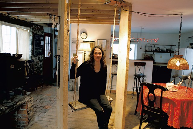 Stacy Hopkins in her jewelry studio, formerly a blacksmith shop - SARAH PRIESTAP