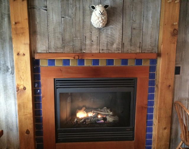 The fireplace at Shepherds Pub in Waitsfield - SUZANNE PODHAIZER